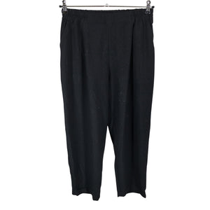 Unisex R-collection - Mittevenivad püksid, suurus 40 - Must (1)