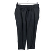 Unisex Trendy Line - Mittevenivad püksid, suurus 44 - Must ()