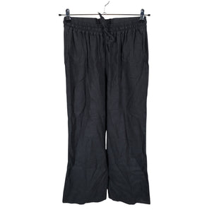 Unisex by Malene Birger - Mittevenivad püksid, suurus 34 - Must (1)
