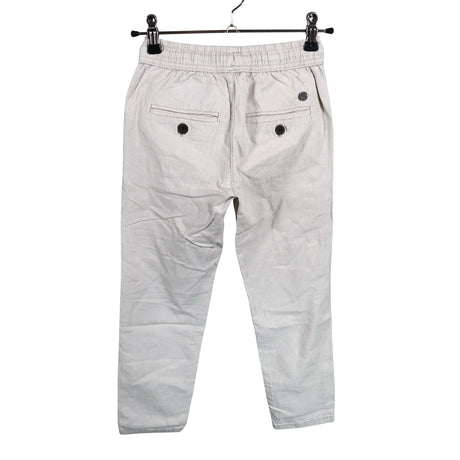 Unisex We - Mittevenivad püksid, suurus 128 - 134 - Beige (2)