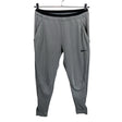 Unisex Nike - Soojenduspüksid, suurus 38 - Hall ()