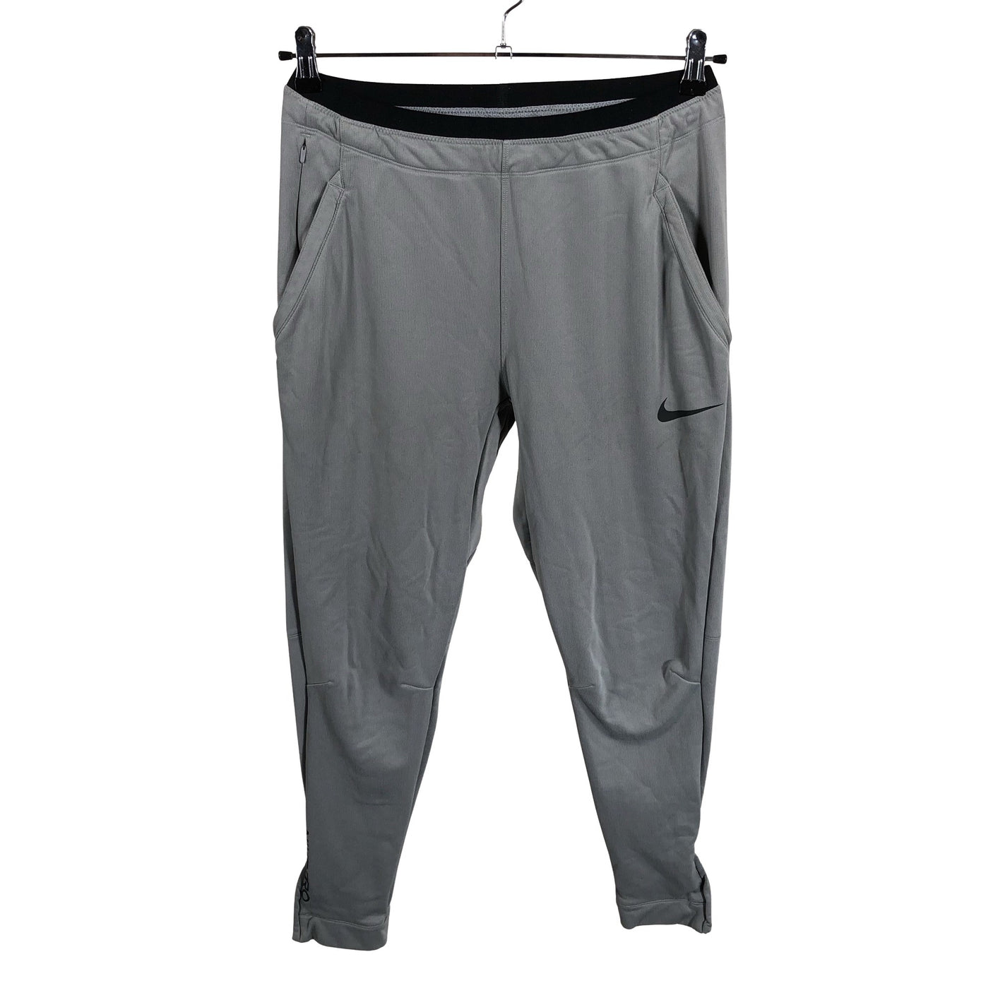 Unisex Nike - Soojenduspüksid, suurus 38 - Hall (1)