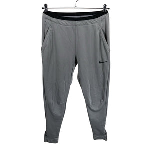 Unisex Nike - Soojenduspüksid, suurus 38 - Hall (1)