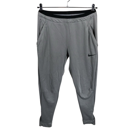 Unisex Nike - Soojenduspüksid, suurus 38 - Hall ()