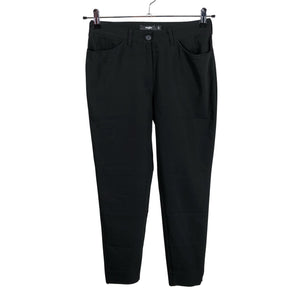 Unisex Voglia - Mittevenivad püksid, suurus 34 - Must (1)