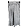 Unisex American Eagle - Mittevenivad püksid, suurus 38 - Hall ()