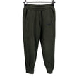 Unisex Puma - Dressikangast püksid, suurus 134 - 140 - Roheline ()