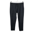 Unisex Holly & Whyte by Lindex - Mittevenivad püksid, suurus 36 - Hall ()