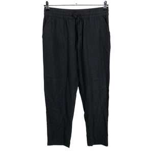 Unisex Noom - Mittevenivad püksid, suurus 38 - Must (1)