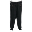 Unisex POMPdeLUX - Mittevenivad püksid, suurus 140 - 146 - Must ()