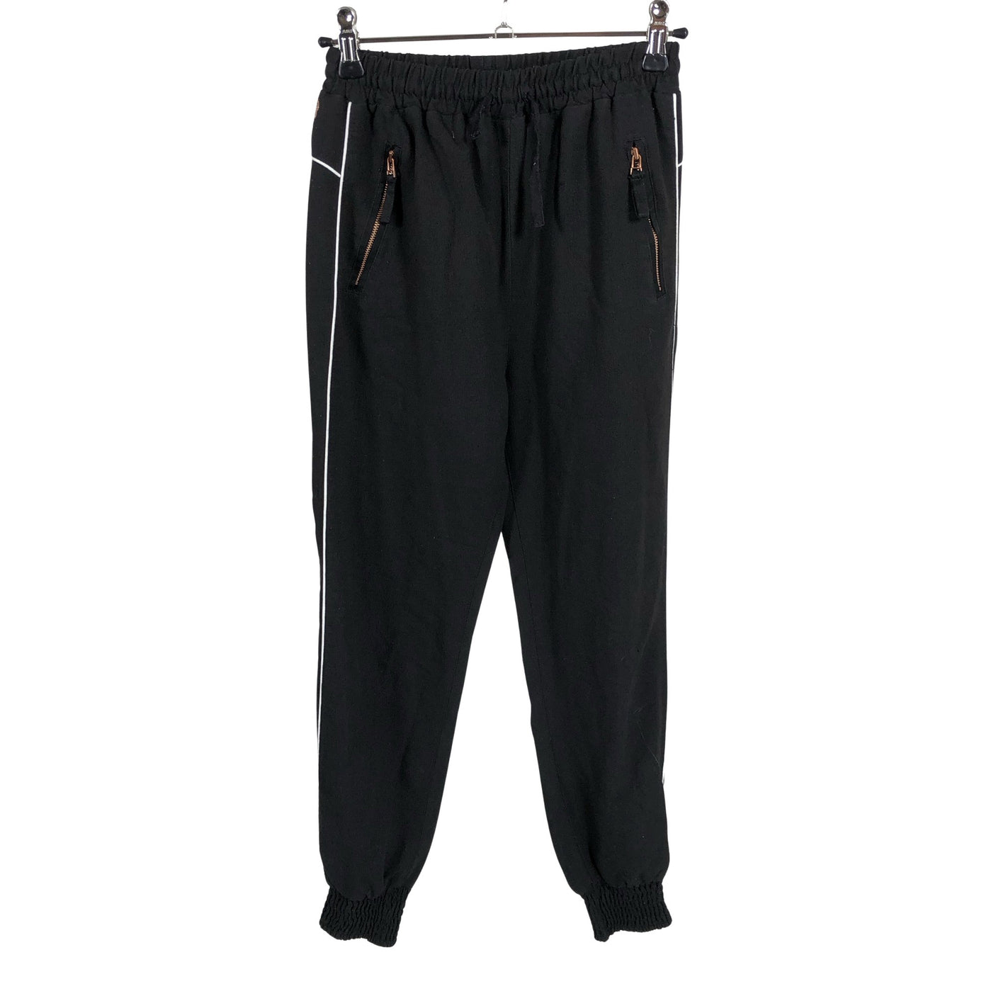 Unisex POMPdeLUX - Mittevenivad püksid, suurus 140 - 146 - Must (1)
