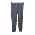 Unisex Nike - Trikotaažist püksid, suurus M - Hall ()
