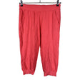 Unisex Puma - Trikotaažist poolpikad püksid, suurus 38 - Roosa ()