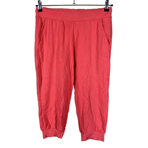 Unisex Puma - Trikotaažist poolpikad püksid, suurus 38 - Roosa (1)
