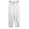 Unisex COS - Mittevenivad püksid, suurus 36 - Beige ()