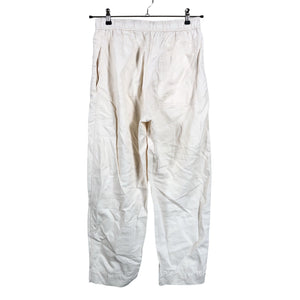 Unisex COS - Mittevenivad püksid, suurus 36 - Beige (3)