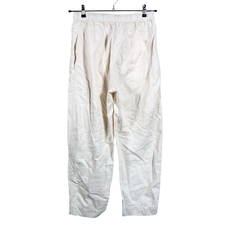Unisex COS - Mittevenivad püksid, suurus 36 - Beige (2)
