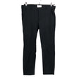 Unisex Free Quent - Mittevenivad püksid, suurus 42 - Must ()