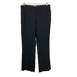 Unisex COS - Mittevenivad püksid, suurus 44 - Must (1)