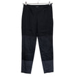 Unisex Marimekko - Mittevenivad püksid, suurus 38 - Must ()