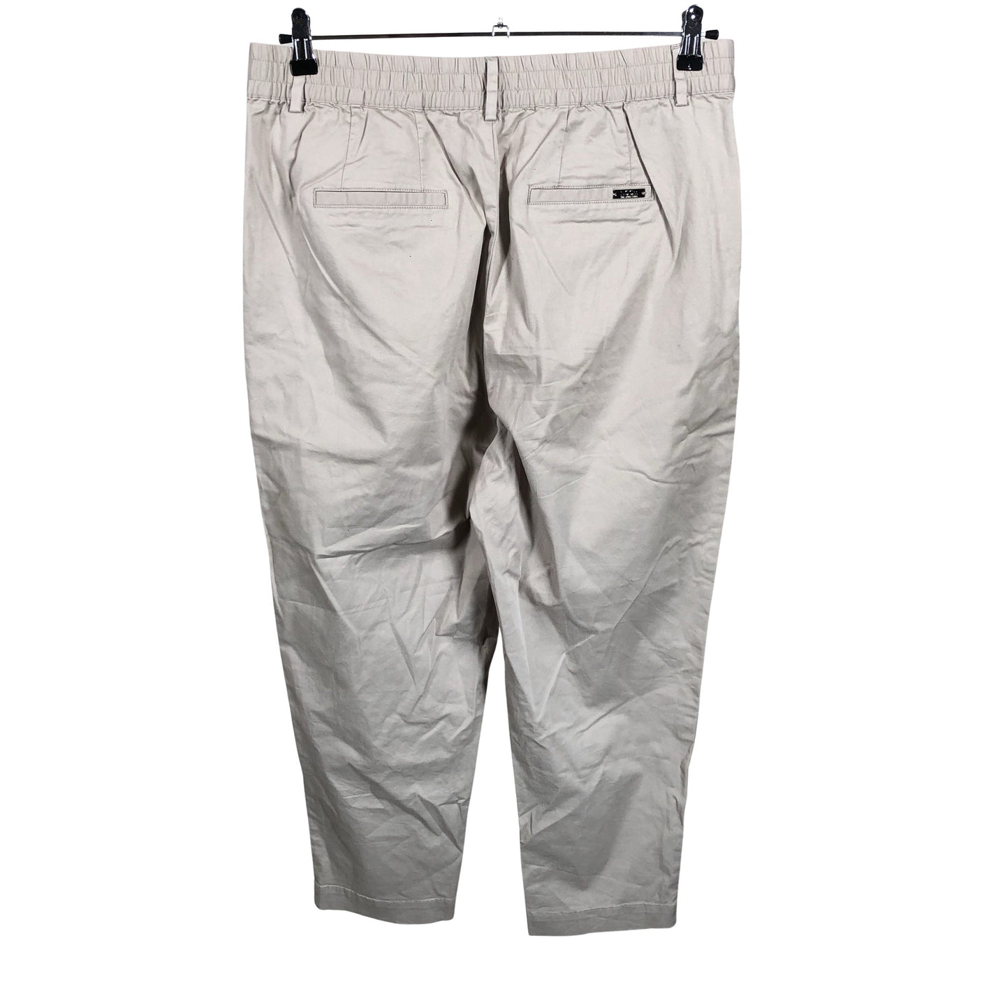 Unisex Noom - Mittevenivad poolpikad püksid, suurus 42 - Beige (2)