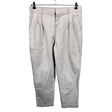 Unisex Noom - Mittevenivad poolpikad püksid, suurus 42 - Beige ()