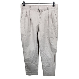 Unisex Noom - Mittevenivad poolpikad püksid, suurus 42 - Beige (1)