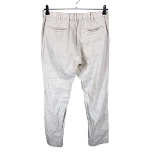 Unisex Uniqlo - Mittevenivad püksid, suurus 38 - Beige (2)