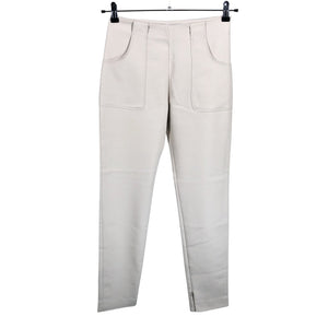 Unisex Caractére - Mittevenivad püksid, suurus 34 - Beige (1)