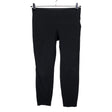 Unisex Lindex - Mittevenivad püksid, suurus 40 - Must ()