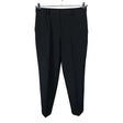 Unisex Uniqlo - Mittevenivad püksid, suurus 38 - Must ()
