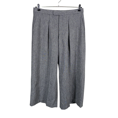 Unisex Uniqlo - Mittevenivad püksid, suurus W30 - Hall ()