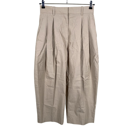 Unisex COS - Mittevenivad püksid, suurus 38 - Pruun ()
