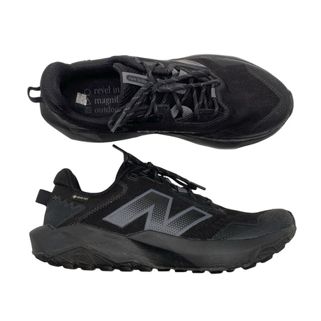 Unisex New Balance - Matkatossud, suurus 40 - Must ()