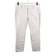 Unisex Part two - Mittevenivad püksid, suurus 42 - Beige ()