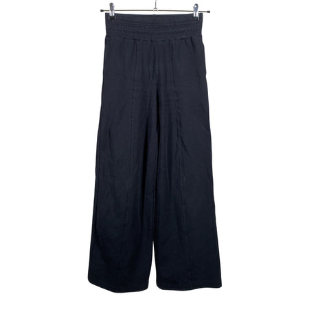 Unisex Hujaus - Dressikangast püksid, suurus 38 - Must ()