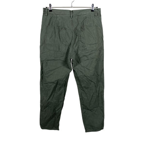 Unisex COS - Mittevenivad püksid, suurus M - Roheline (2)