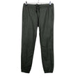 Unisex COS - Mittevenivad püksid, suurus 38 - Roheline ()