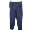 Unisex COS - Mittevenivad püksid, suurus 40 - Sinine ()