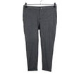 Unisex Part two - Mittevenivad püksid, suurus 38 - Hall ()