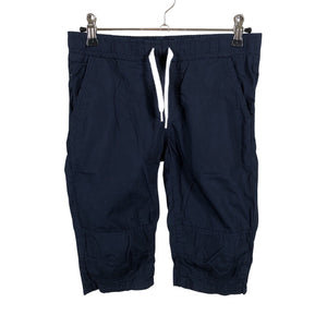 Unisex Lindex - Mittevenivad poolpikad püksid, suurus 134 - 140 - Sinine (1)
