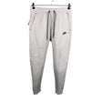 Unisex Nike - Dressikangast püksid, suurus 38 - Beige ()