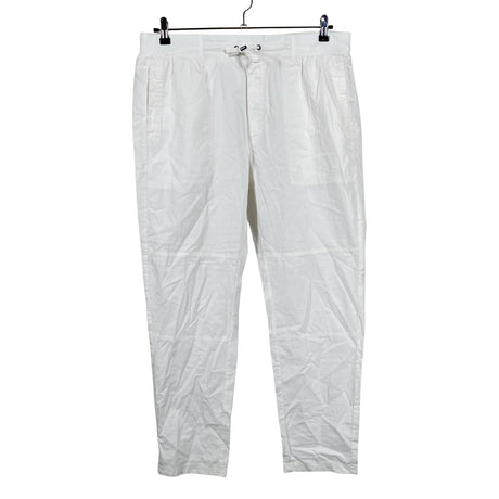 Unisex Noom - Mittevenivad püksid, suurus 44 - Valge ()