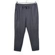 Unisex Holly & Whyte by Lindex - Mittevenivad püksid, suurus 38 - Hall ()
