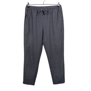 Unisex Holly & Whyte by Lindex - Mittevenivad püksid, suurus 38 - Hall (1)