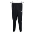 Unisex Puma - Soojenduspüksid, suurus 34 - Must ()
