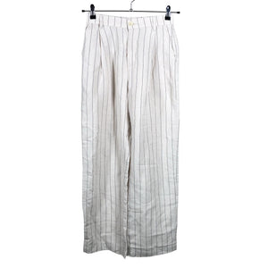 Unisex Lindex - Mittevenivad püksid, suurus 36 - Beige (1)