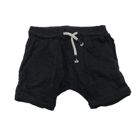 Unisex Next - Trikotaažist lühikesed püksid, suurus 68 - 74 - Must ()