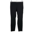Unisex Lindex - Mittevenivad püksid, suurus 42 - Must ()