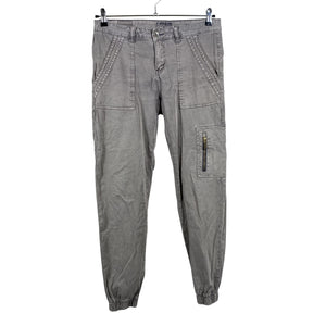 Unisex Cream - Mittevenivad püksid, suurus W31 - Hall (1)